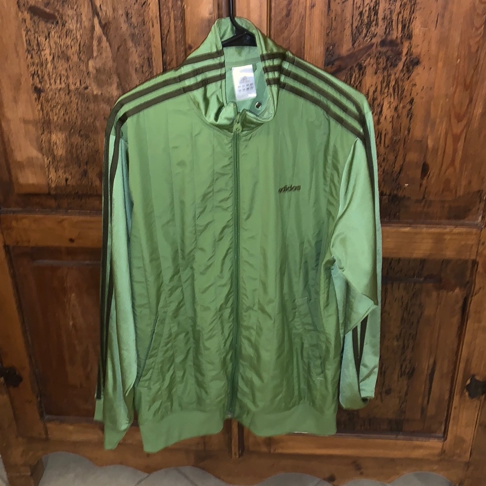 Used twice Adidas size large fits more like xl